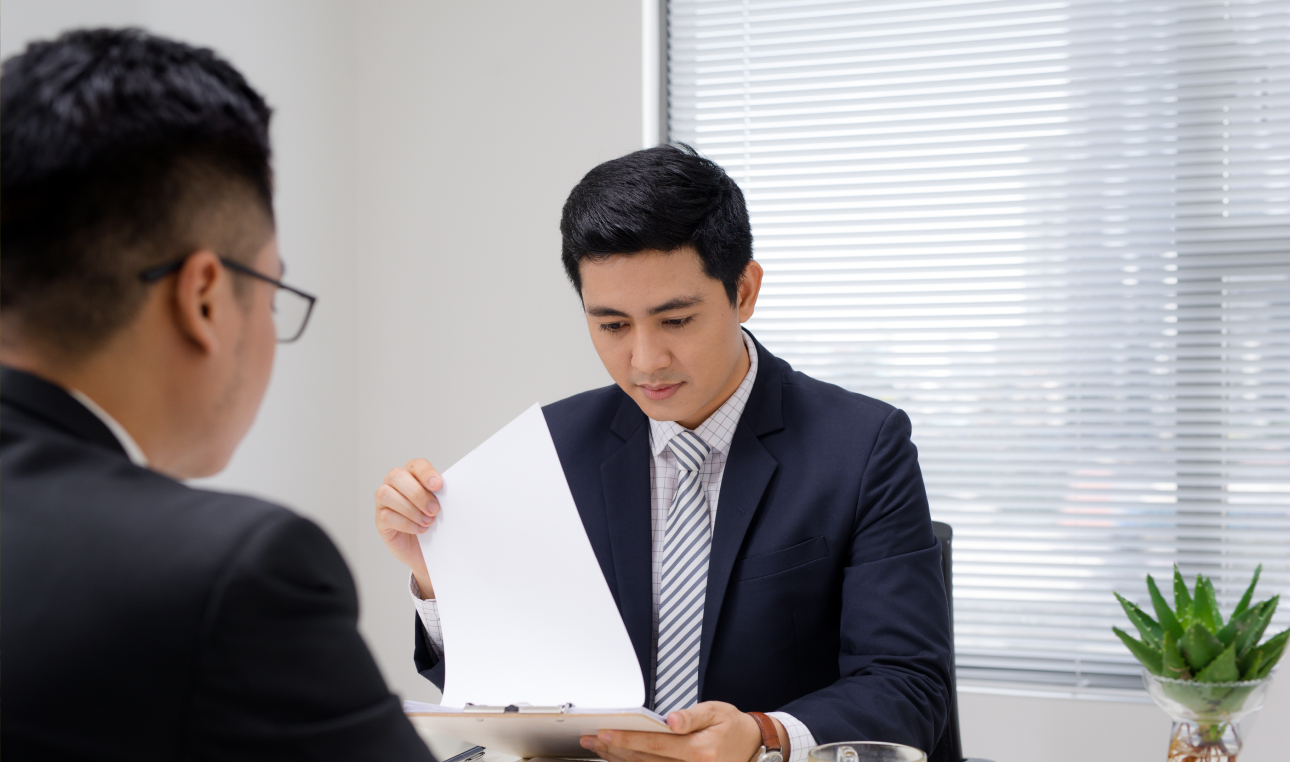 office worker checking document 