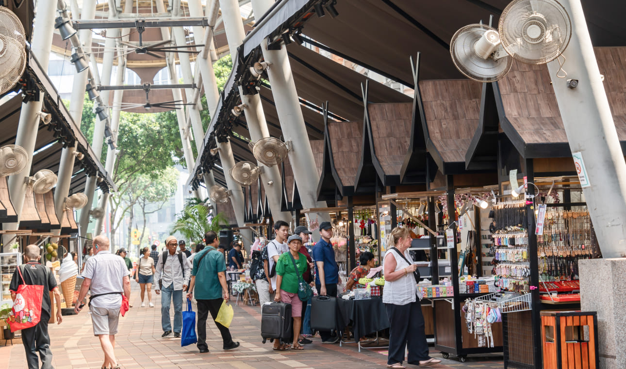 local people buying and selling goods in central market